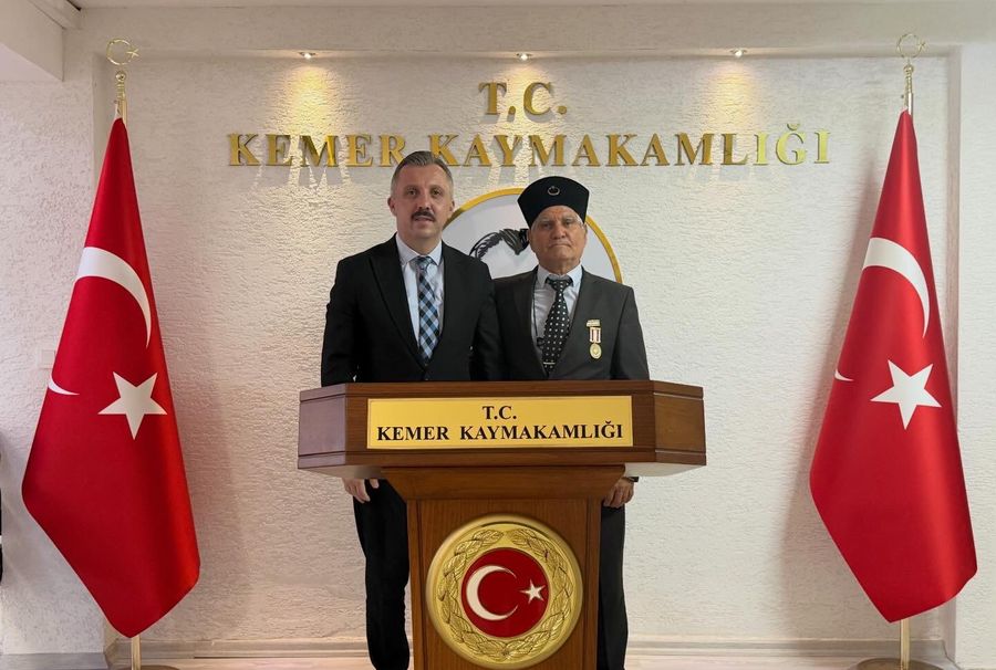 KIBRIS GAZİSİ ŞEVKET UÇARCI’DAN KEMER KAYMAKAMI AHMET SOLMAZ’A ANLAMLI ZİYARET
